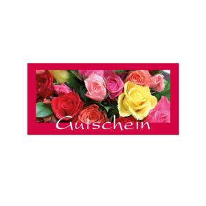 Auf einem rotpinkten Hintergrund ist ein Foto von mehreren bunten Rosen. Darunter steht in weißer Schrift "Gutschein"