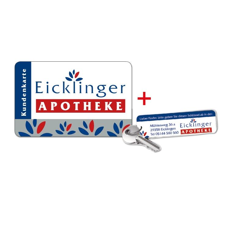 Beispiel der Kundenkarte mit Schlüsselfinder der Eicklinger Apotheke. Neben der Kundenkarte liegt ein Schlüssel mit kleinem Ahnänger.